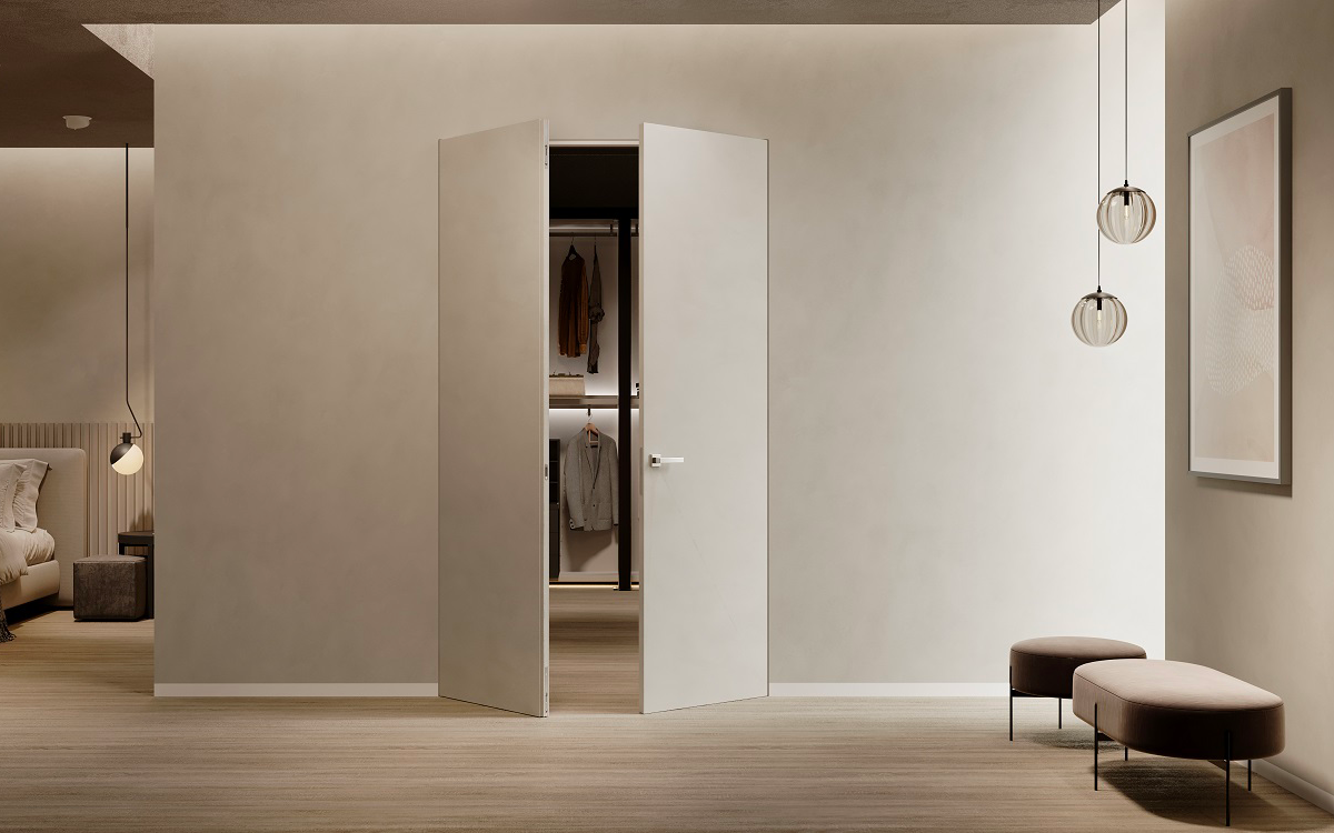 Le porte filomuro Absolute Swing, perfette per una cabina armadio.